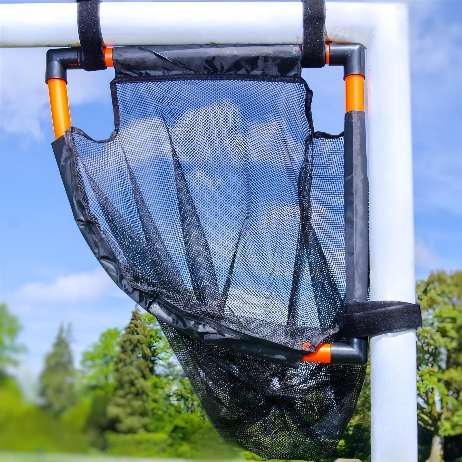 Hero product photo of the TopCorner training target strapped to the top corner of a goal